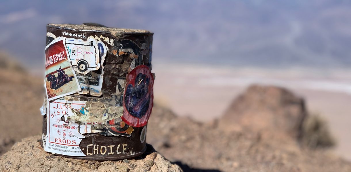 A can in the desert with the text Choice