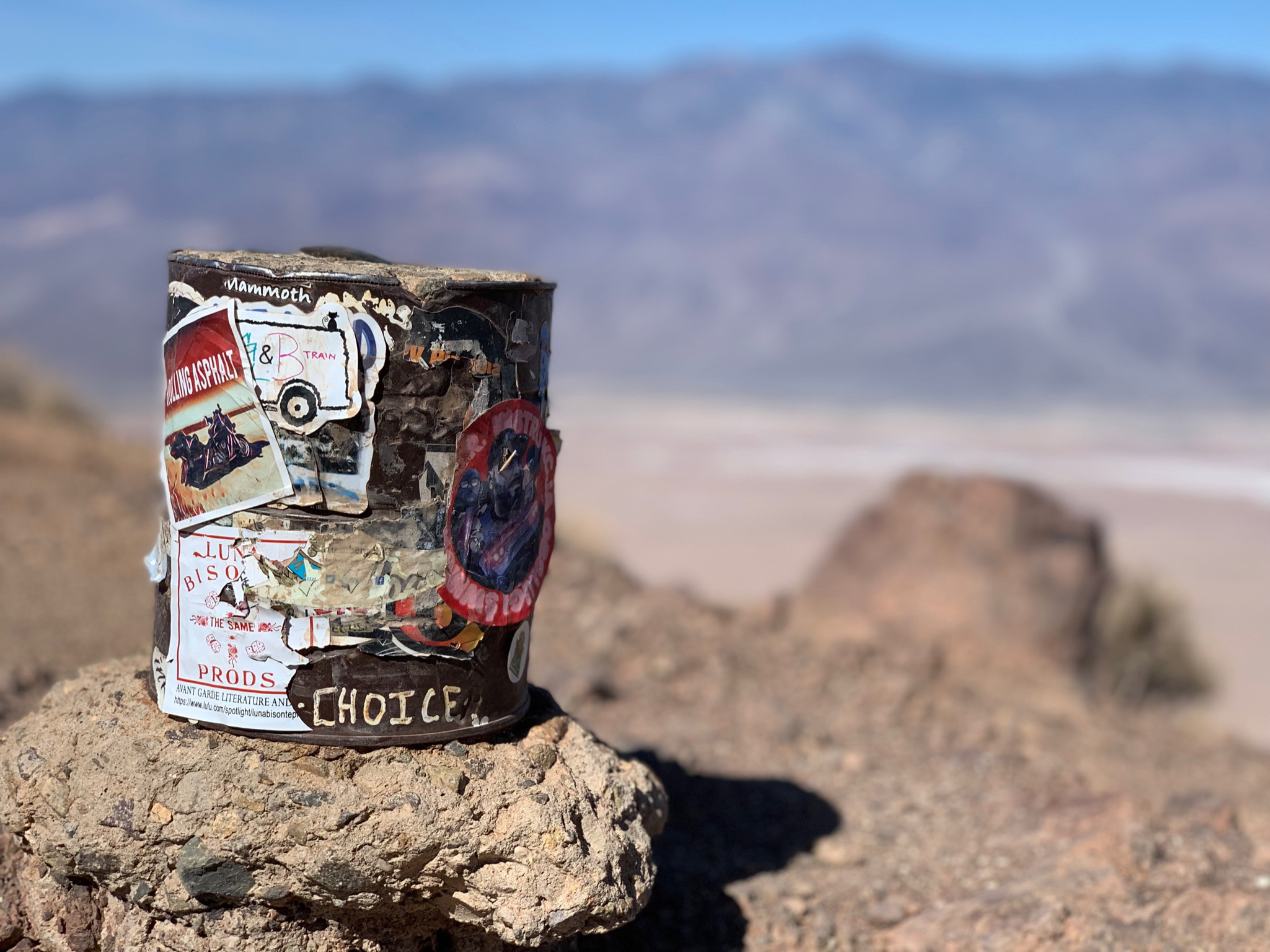 A can in the desert with the text Choice